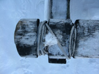 Plank sled (komatiks cross pieces) are attached by using rope lashing - to give the sled flex over the rough drifted snow and sea ice.