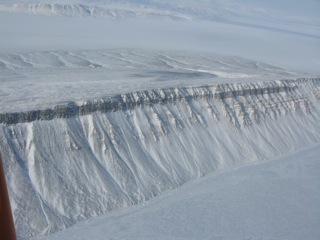 Stratified geology along the shore of Eureka Sound, east shore of Axel Heiberg Island.