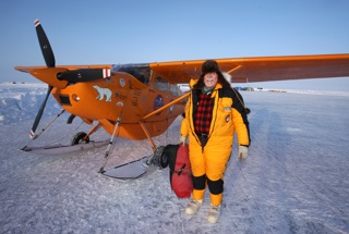 Art, in his yellow down polar flying suit, preparing to put the Tanis engine cover on the Polar Pumpkin shortly after an early morning 2 AM arrival at Ice Station Barneo - April 7, 2013 - approximately 20 miles from the Geographic North Pole.