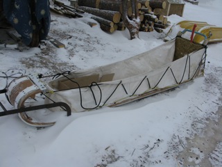In areas of deep soft snow, toboggans are often used instead of the traditional basket dog sleds.