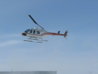 Bell Long Ranger helicopter arriving at Eureka Weather Station from Resolute Bay for the transport of research scientists.