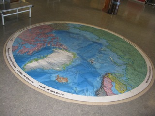  The Inuvik airport terminal building is a modern - very clean - well kept facility.  In the middle of the lobby floor there is a map of the Circumpolar North.