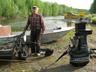 Lyman Vincent, homesteader from the Cosna River, fabricates one good outboard motor from the parts of three