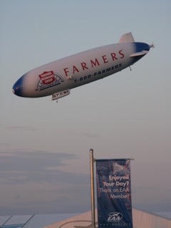 The Farmers' blimp doing aerobatics Oshkosh Airventure 2011